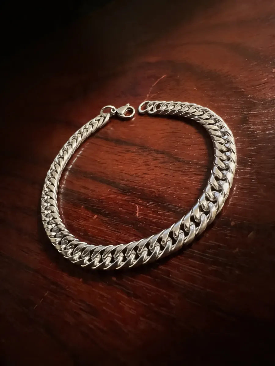 Pulsera tipo cubana plateada P-0023