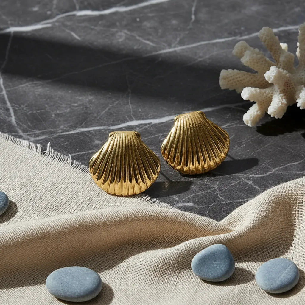 Aretes dorados concha marina texturizada A-0026