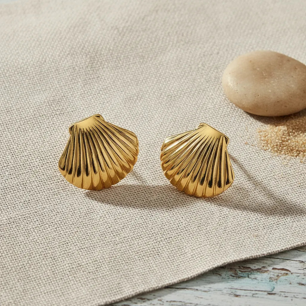 Aretes dorados concha marina texturizada A-0026