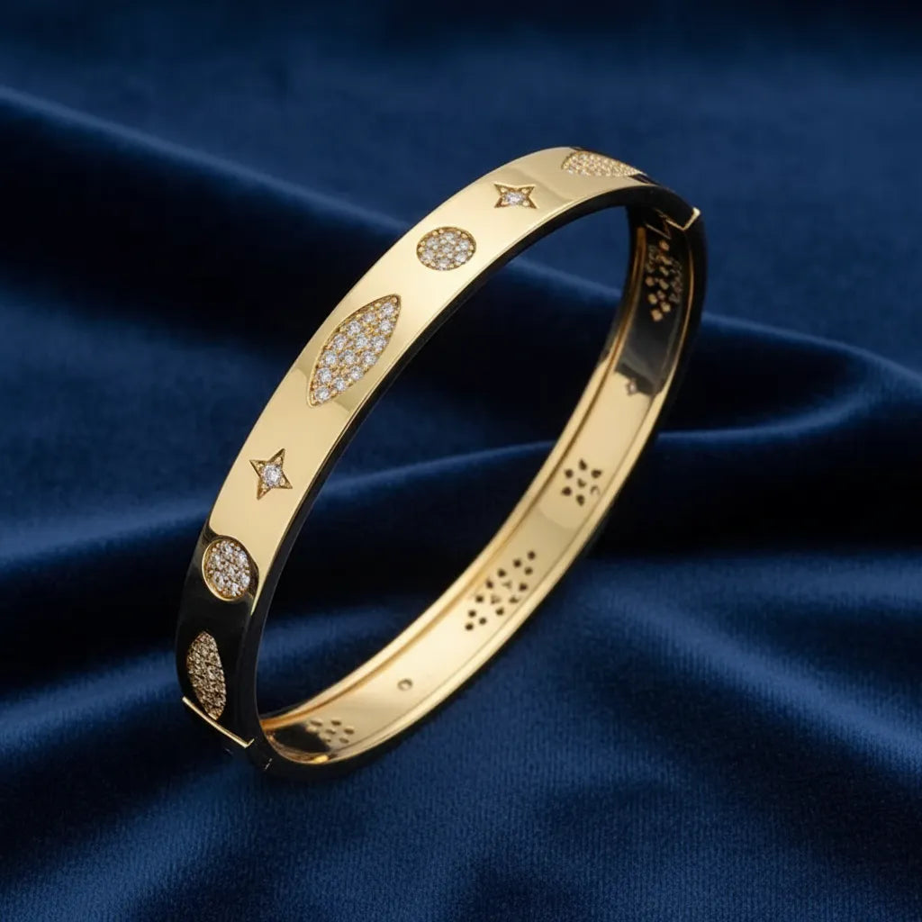 Pulsera brazalete dorado con zirconias P-0040