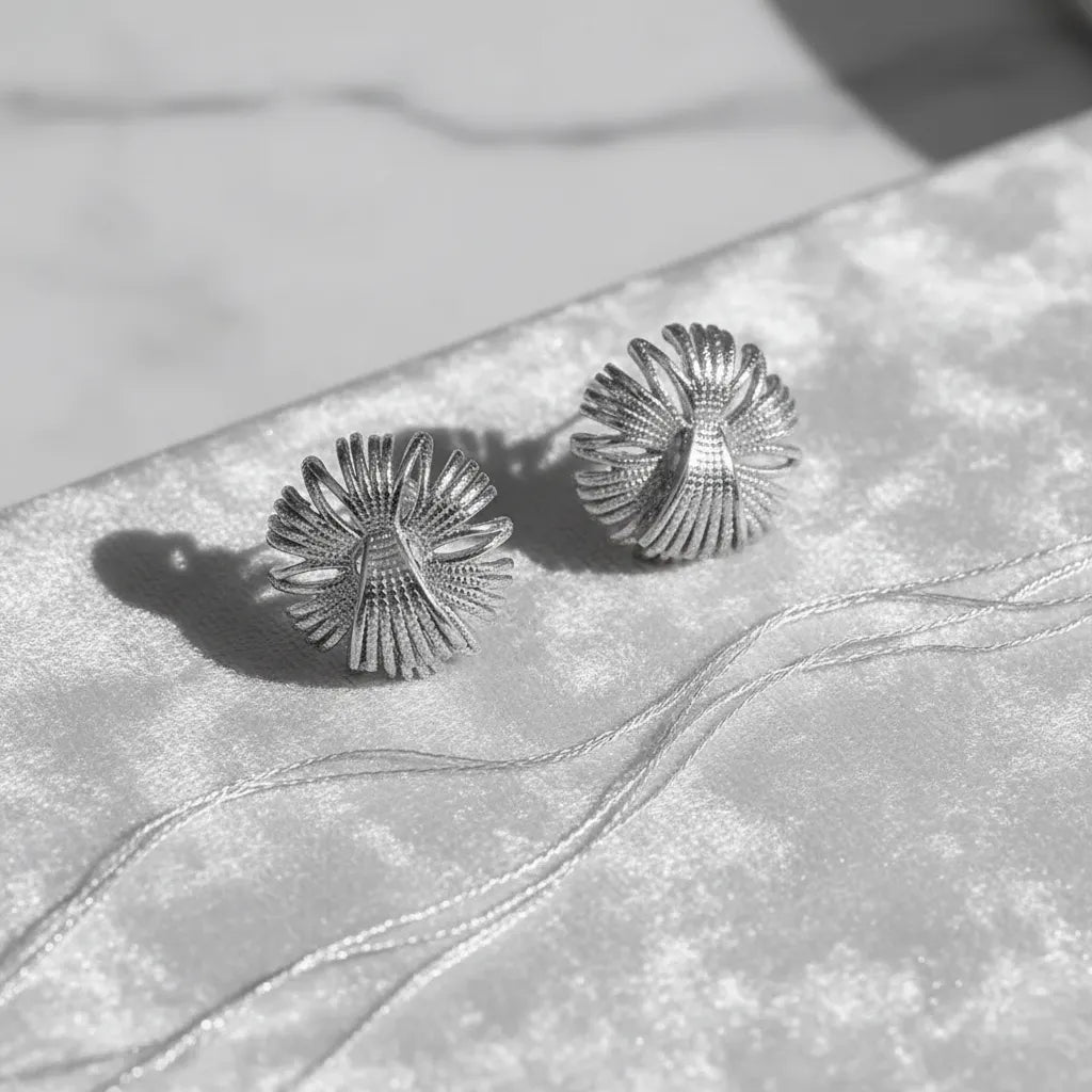 Aretes plateados flor radial texturizada A-0045