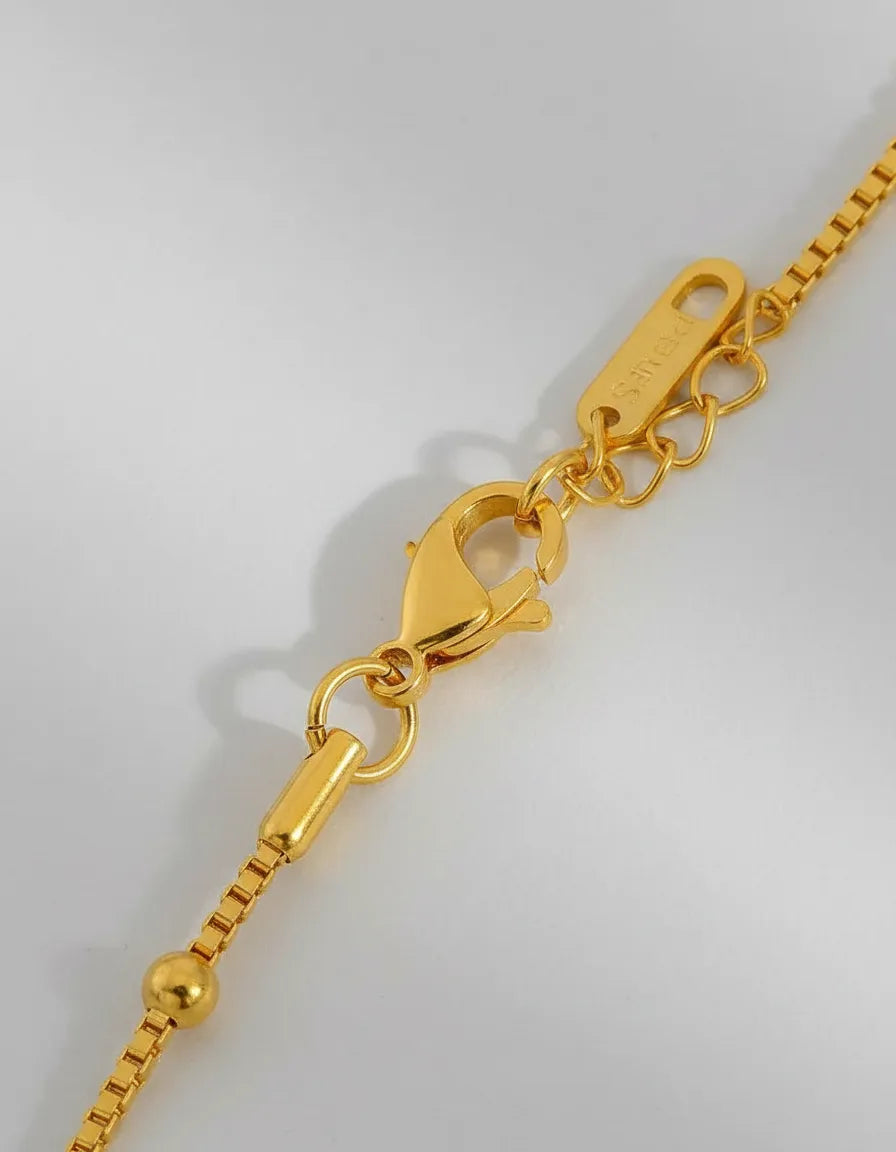 Collar dorado con esferas C-0011