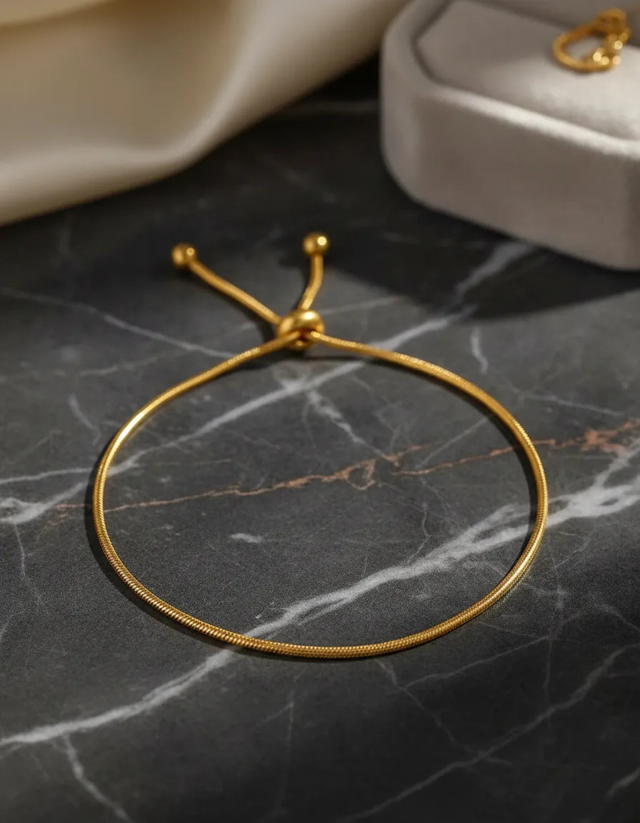 Pulsera ajustable tipo cordón dorado P-0014