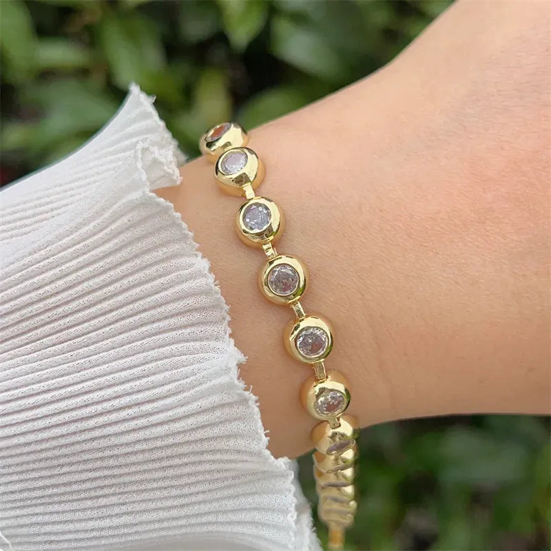 Pulsera dorada tipo tennis con zirconias engastadas P-0019